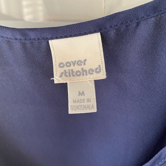 Blue sleeveless top with gold piece in front - Picture 3 of 5